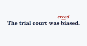 Redline edit striking "was biased" and inserting "erred" in the sentence "The trial court was biased."